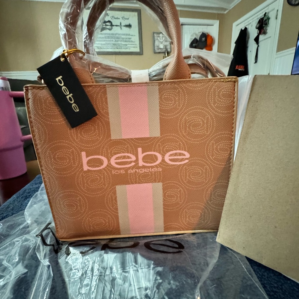 NWT- (Wrapped and never used)Bebe Light Pink Tote Bag